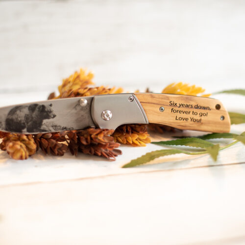 bear on knife blade and custom message on handle